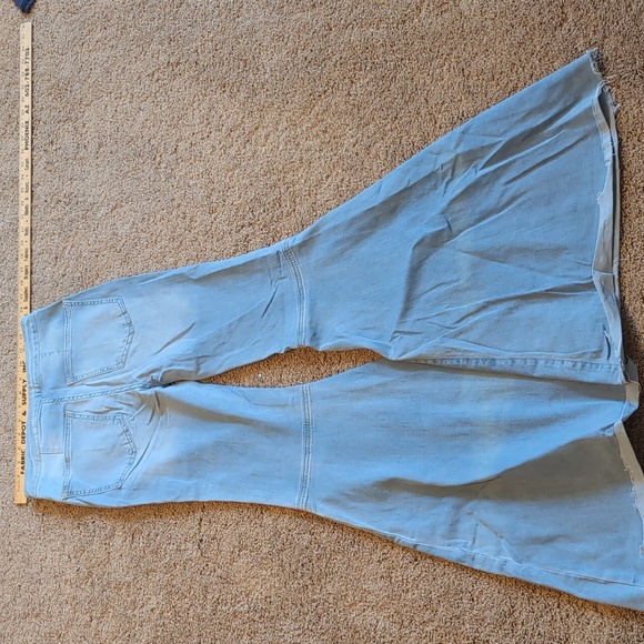 Free People jeans. Size 27R. Large bell bottom. Light wash. - Picture 5 of 8